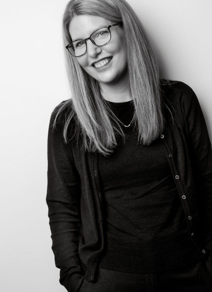 Black and white portrait of Ruth Limkin smiling