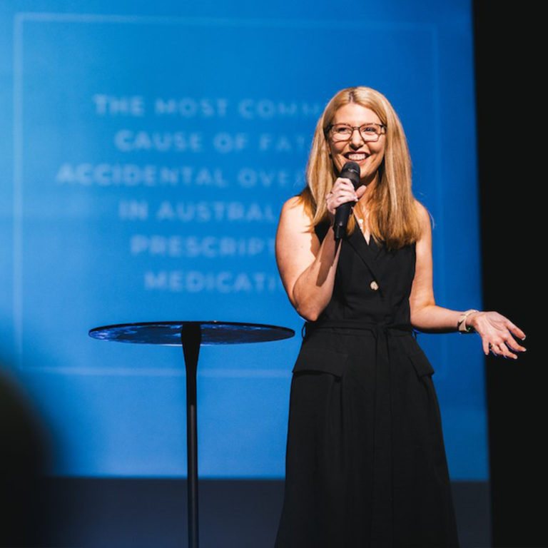 Ruth Limkin speaking on stage